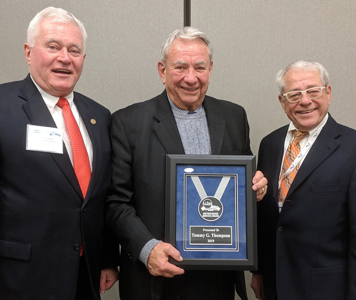 Roger Utnehmer, Gov. Tommy Thompson, and John Laabs